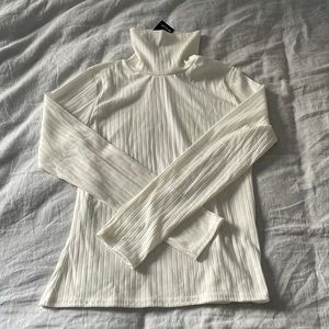 White turtleneck top